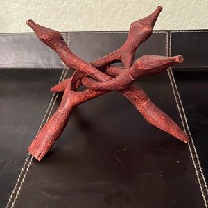 Carved wooden tripod stand